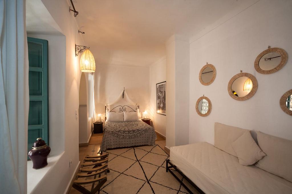 Postel nebo postele na pokoji v ubytování Riad la Cle de la Medina, location en exclusivite