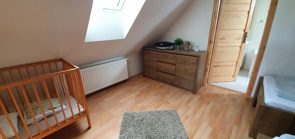 Postel nebo postele na pokoji v ubytování Penzion Dolní Dunajovice