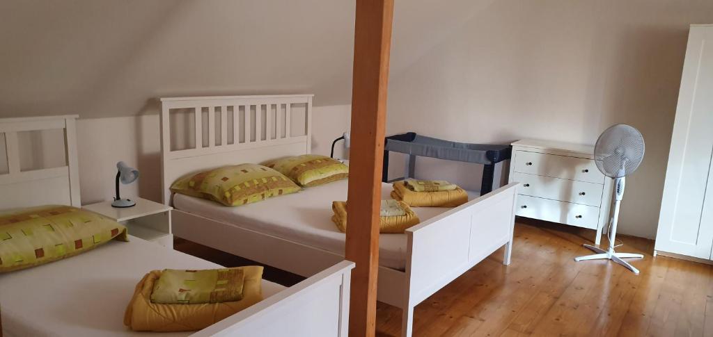Postel nebo postele na pokoji v ubytování Penzion Dolní Dunajovice