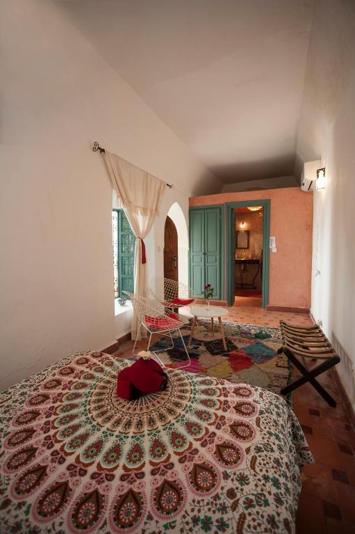 Postel nebo postele na pokoji v ubytování Riad la Cle de la Medina, location en exclusivite