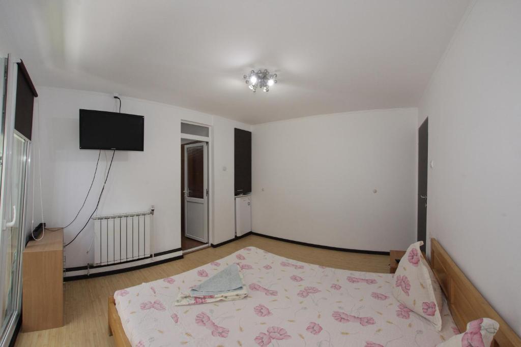 Postel nebo postele na pokoji v ubytování Casa Francisc