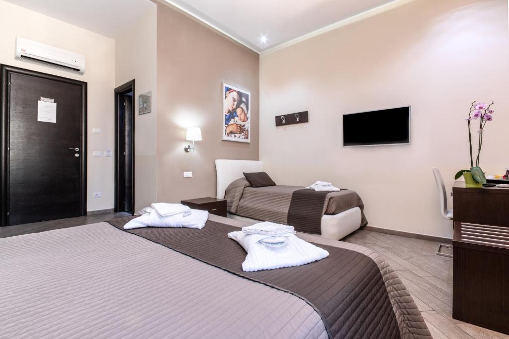 Posteľ alebo postele v izbe v ubytovaní Mia Resort