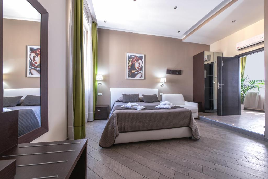 Posteľ alebo postele v izbe v ubytovaní Mia Resort