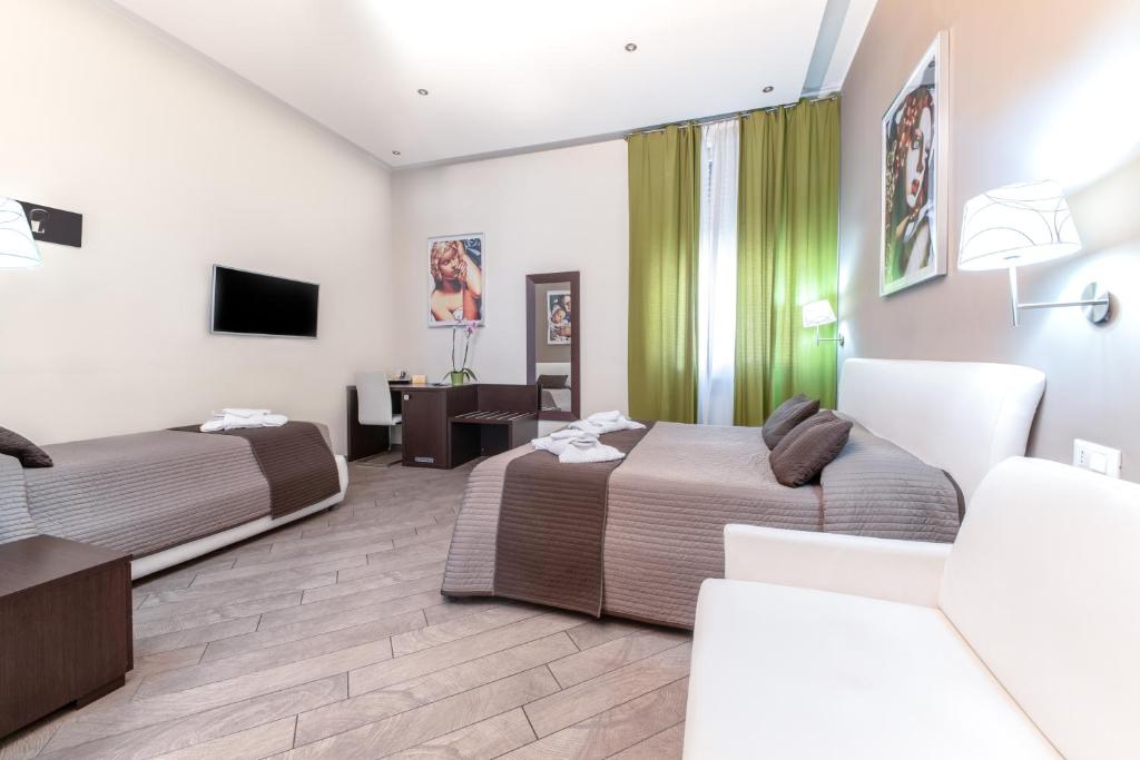 Televízia a/alebo spoločenská miestnosť v ubytovaní Mia Resort