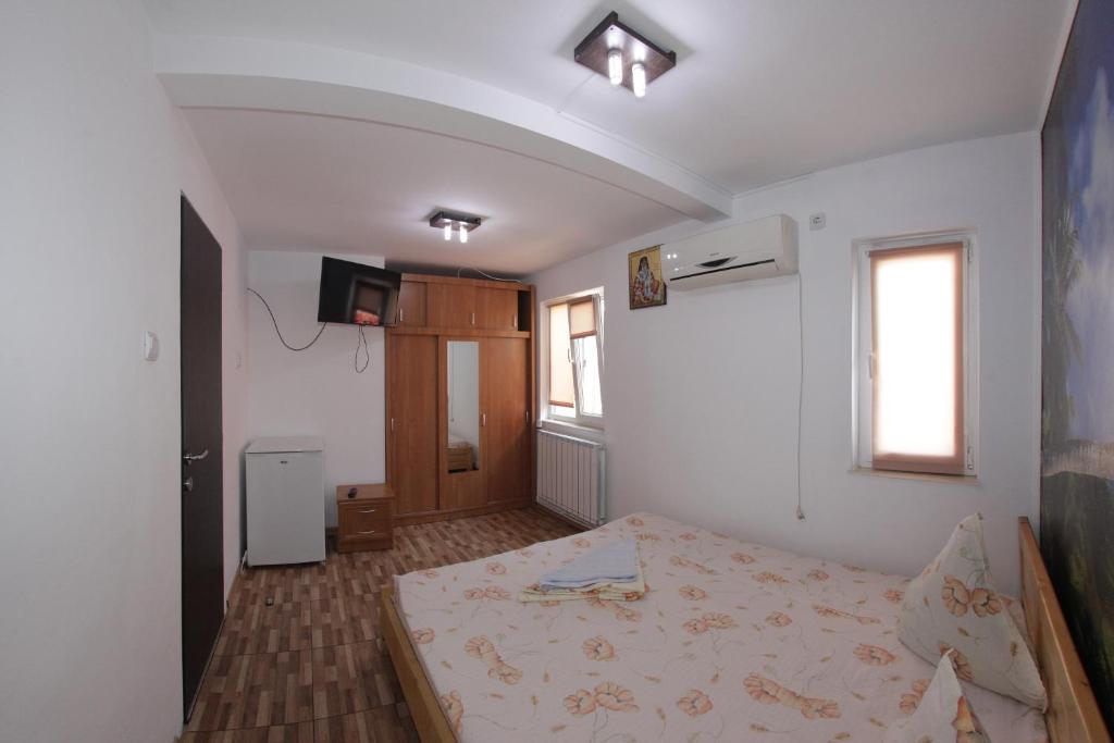 Postel nebo postele na pokoji v ubytování Casa Francisc