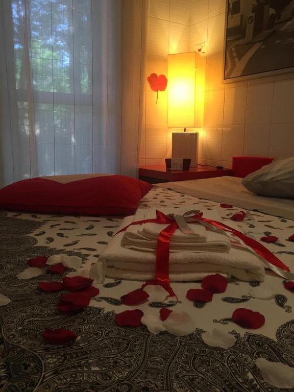 Postel nebo postele na pokoji v ubytování B&B Le Colombine