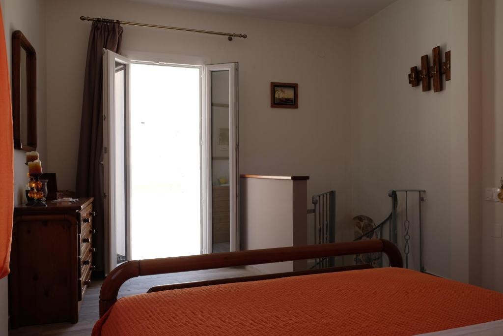 Postel nebo postele na pokoji v ubytování Kalderimi Home