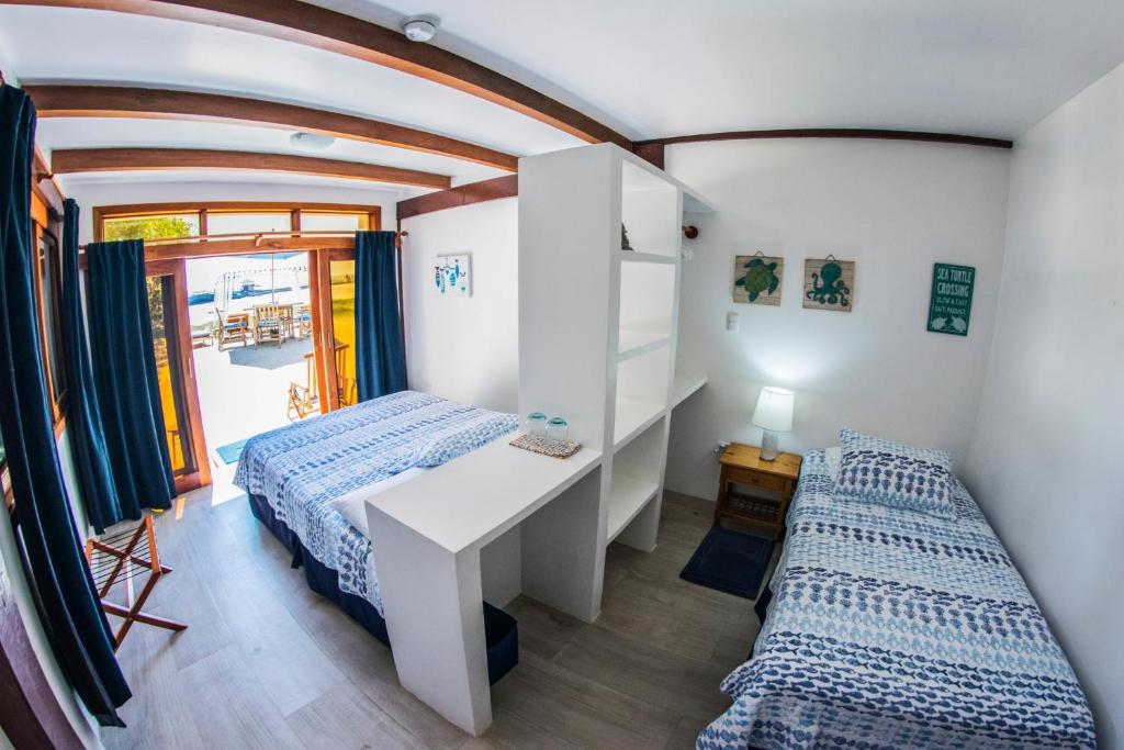 Postel nebo postele na pokoji v ubytování The Isabela Beach House