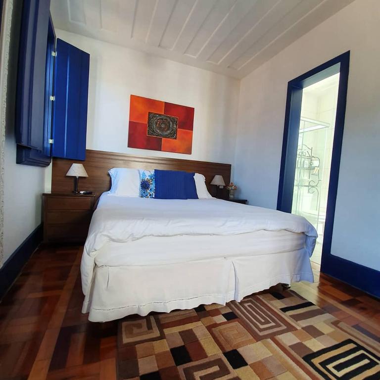 Postel nebo postele na pokoji v ubytování Casa dos Meninos B&B