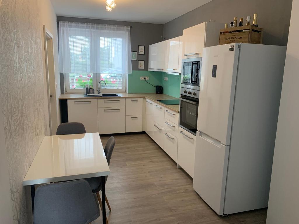 Kuchyň nebo kuchyňský kout v ubytování Tolarova Apartmán