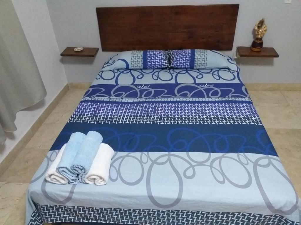 
A bed or beds in a room at Dayran Castellon
