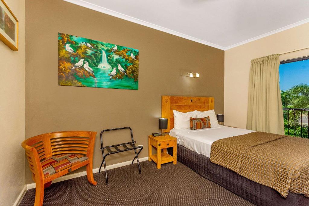 Postel nebo postele na pokoji v ubytování Quality Hotel Darwin Airport