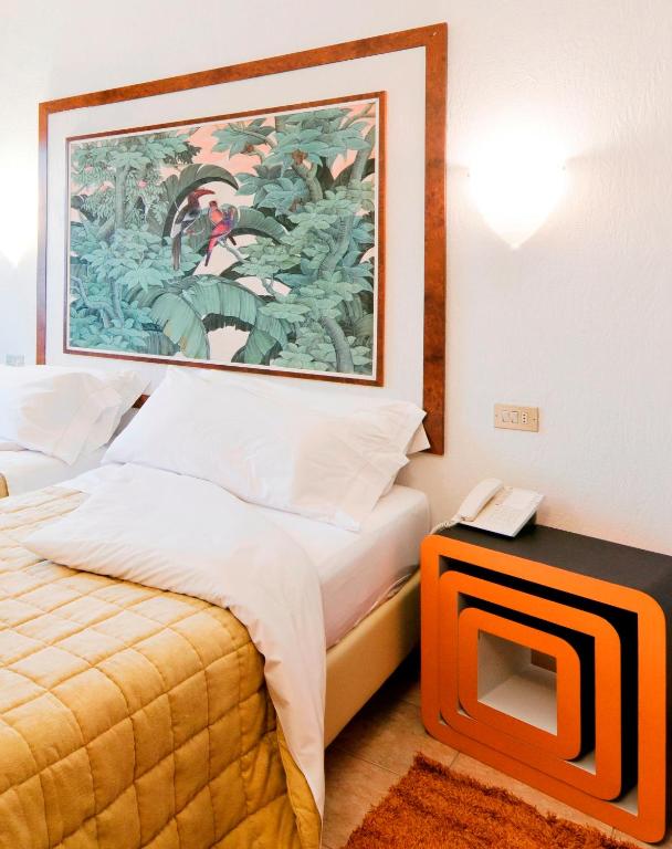 Posteľ alebo postele v izbe v ubytovaní Antico Albergo Madonna