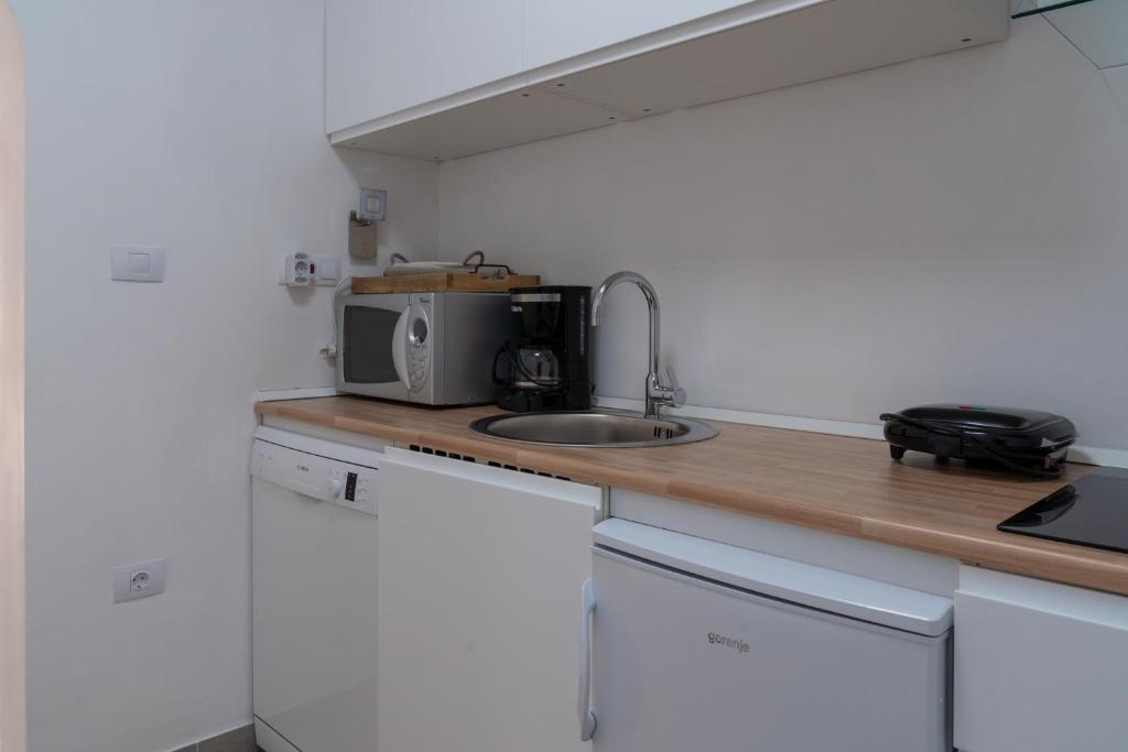 Kuchyň nebo kuchyňský kout v ubytování The FOXhouse