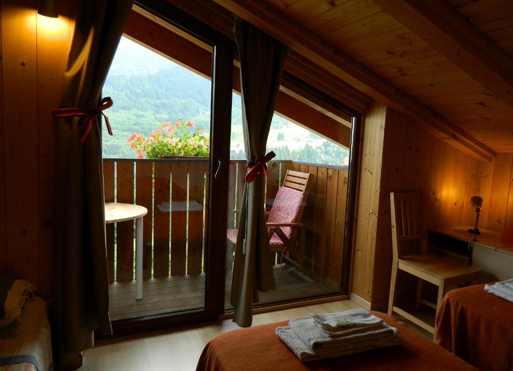Postel nebo postele na pokoji v ubytování B&B Alla Fontana