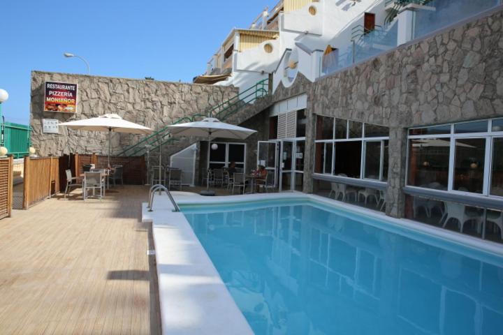 Bazén v ubytovaní Duplex Playa del Cura beautiful ocean view alebo v jeho blízkosti