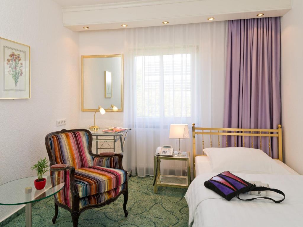 Postel nebo postele na pokoji v ubytování Hotel Palmenhof