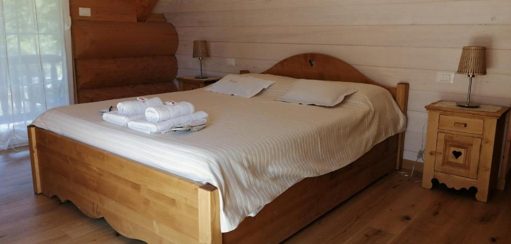 Letto o letti in una camera di Chalet le Dorf