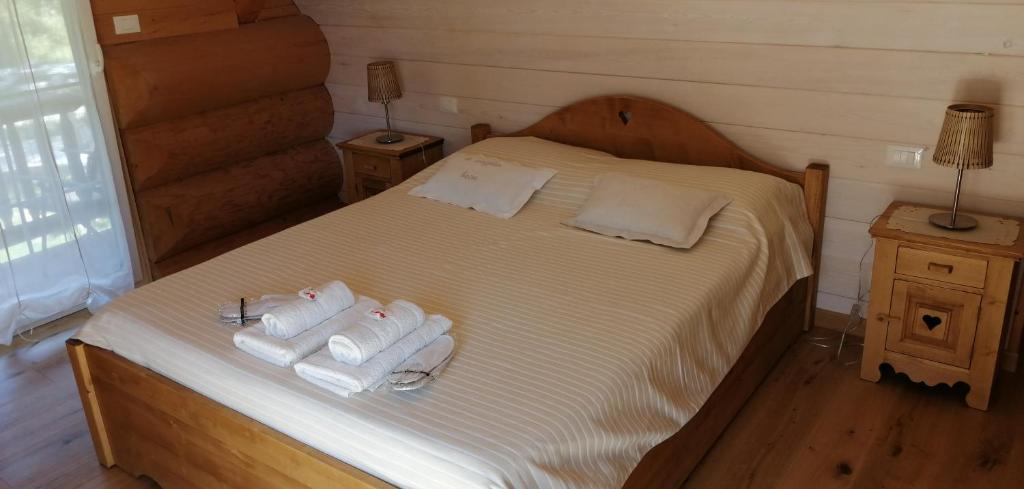 Letto o letti in una camera di Chalet le Dorf