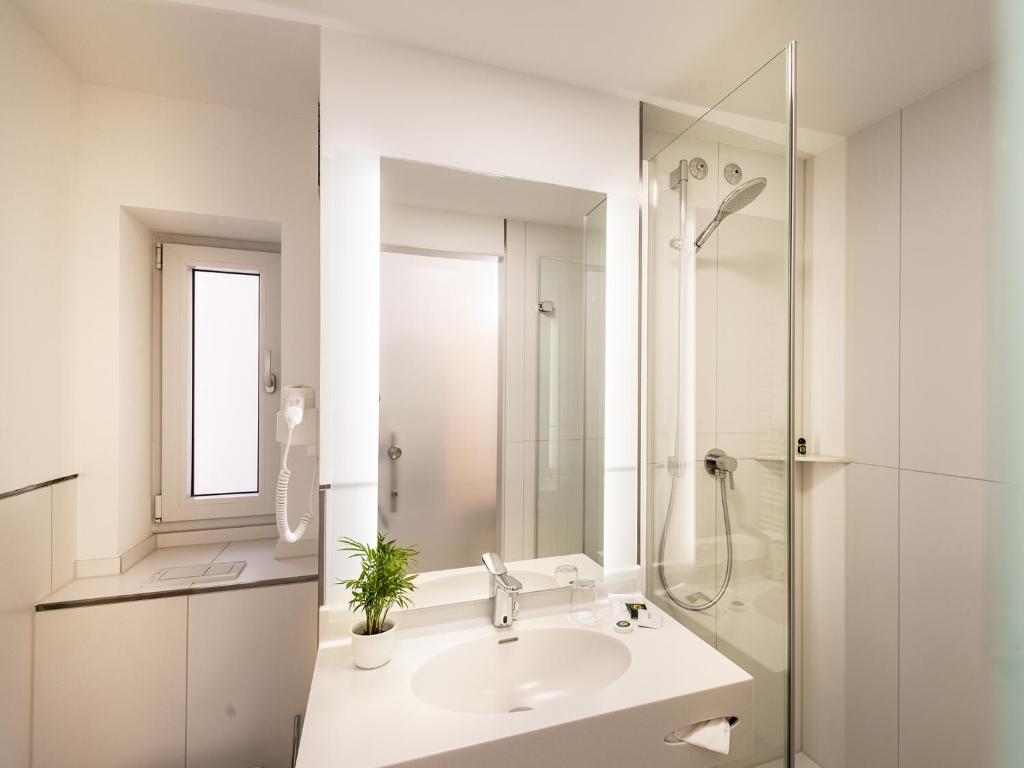 Koupelna v ubytování Hotel Palmenhof