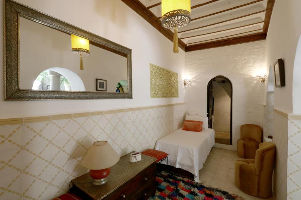 Postel nebo postele na pokoji v ubytování Riad Merstane Marrakech