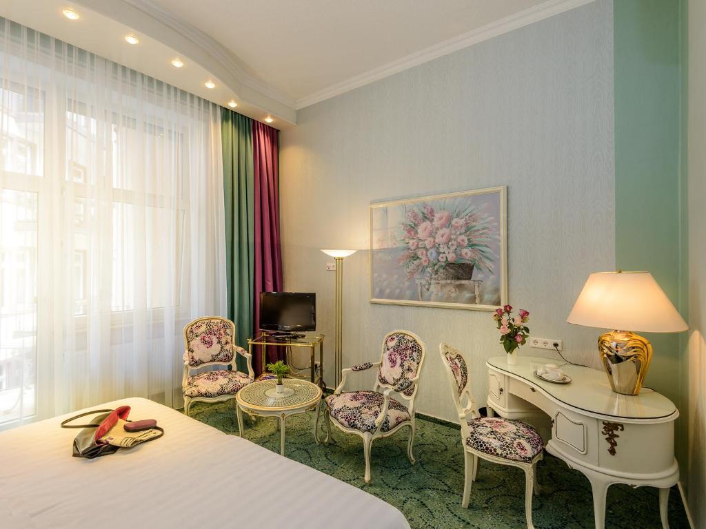 Postel nebo postele na pokoji v ubytování Hotel Palmenhof