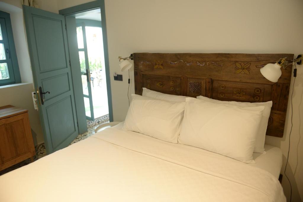 Postel nebo postele na pokoji v ubytování Oalis Boutique Hotel