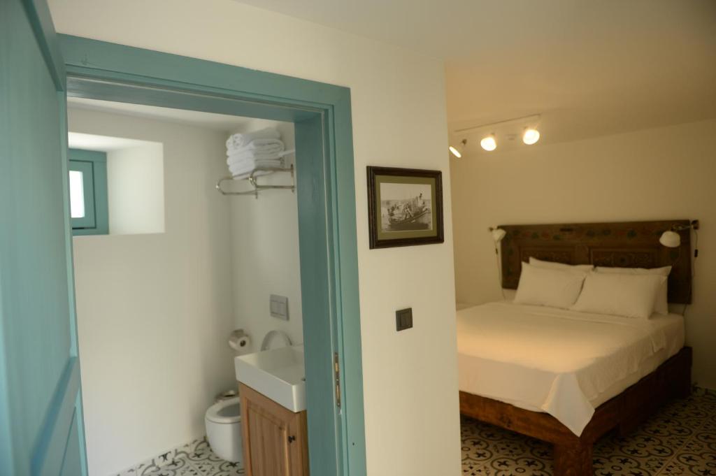 Postel nebo postele na pokoji v ubytování Oalis Boutique Hotel