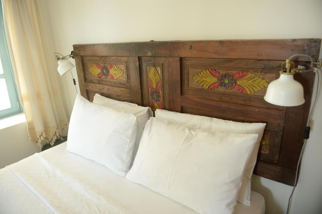 Postel nebo postele na pokoji v ubytování Oalis Boutique Hotel