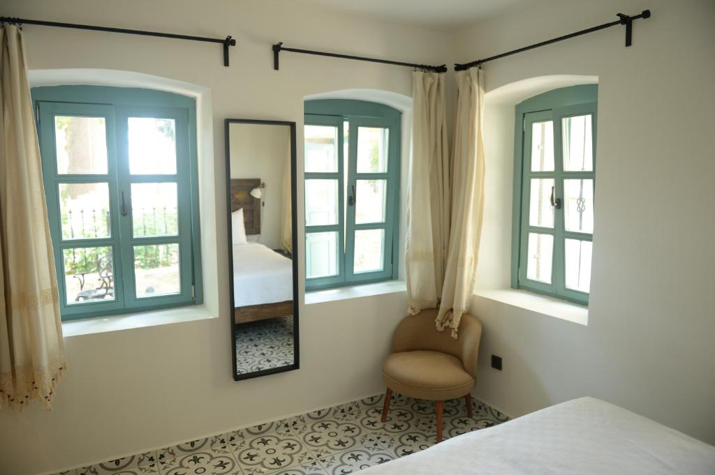 Postel nebo postele na pokoji v ubytování Oalis Boutique Hotel