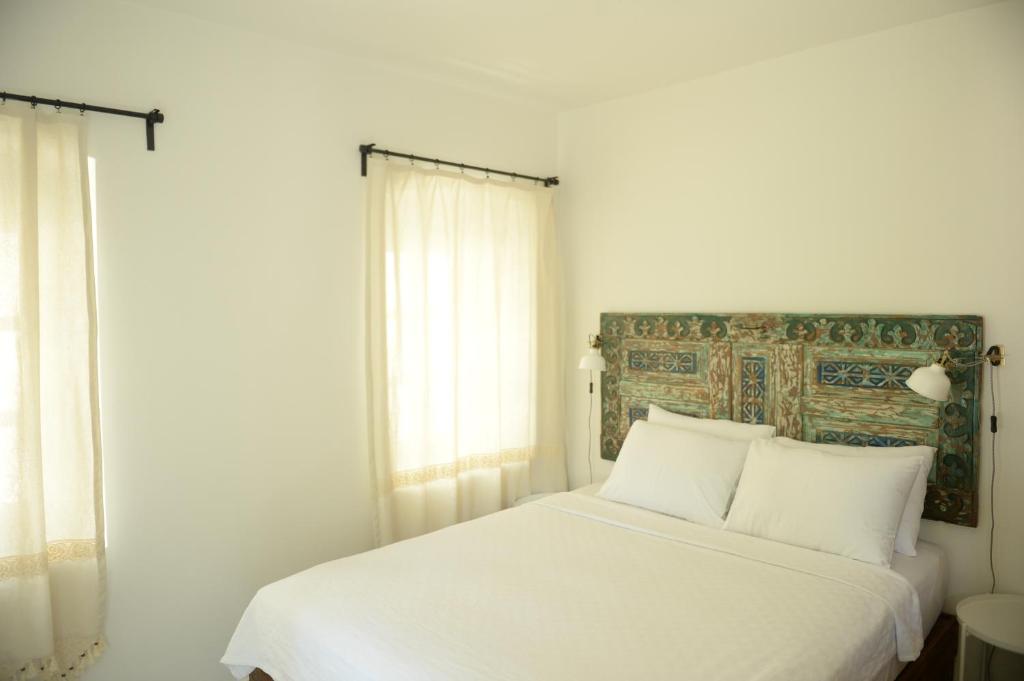 Postel nebo postele na pokoji v ubytování Oalis Boutique Hotel