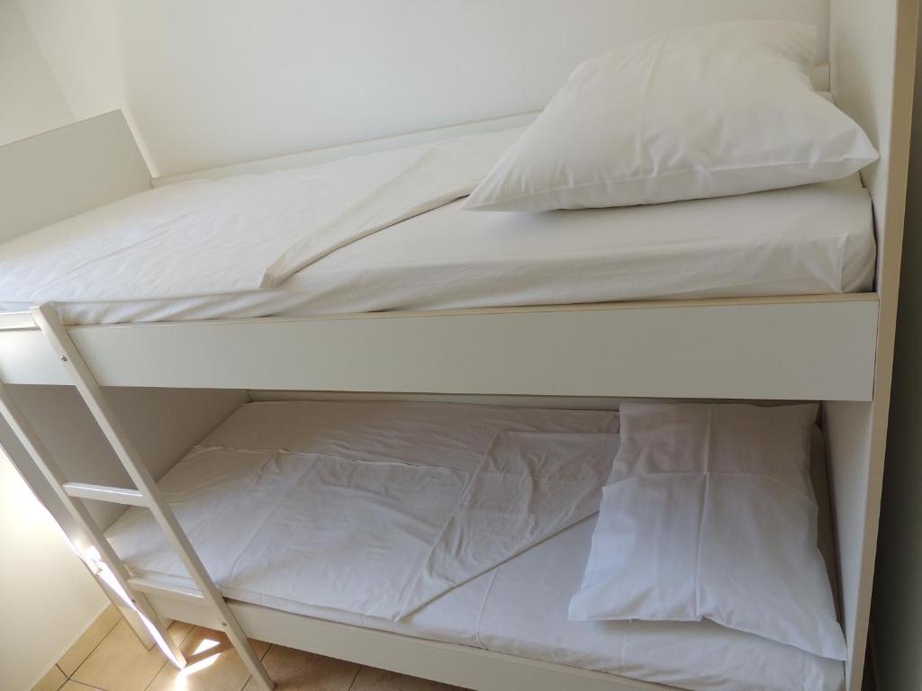 Un pat sau paturi într-o cameră la Apartment Šušanj