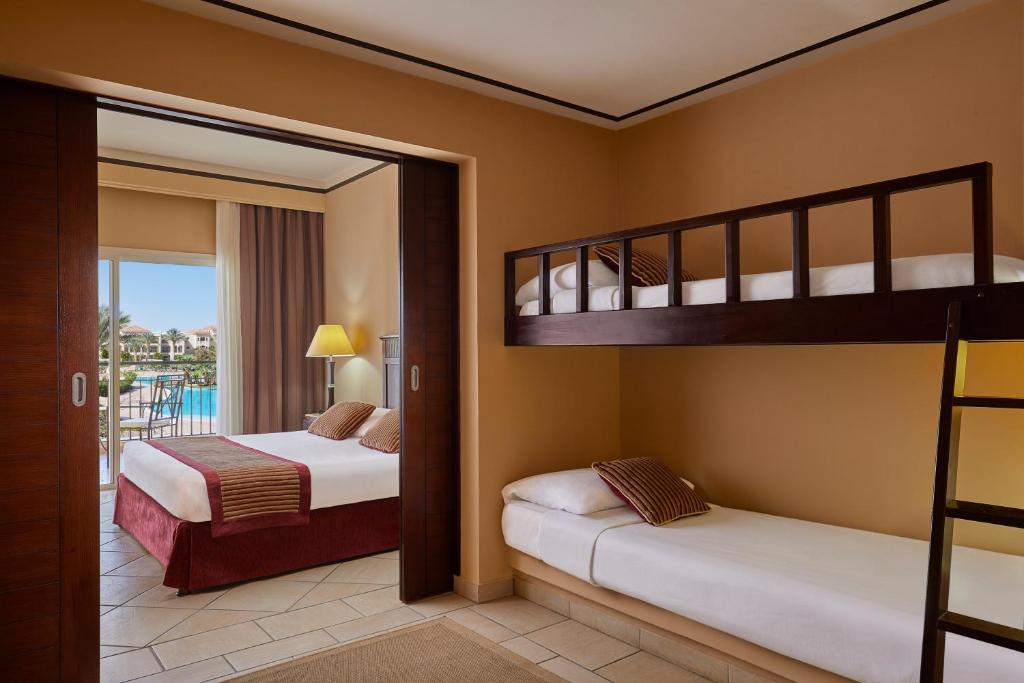 Postel nebo postele na pokoji v ubytování JAZ Mirabel Resort