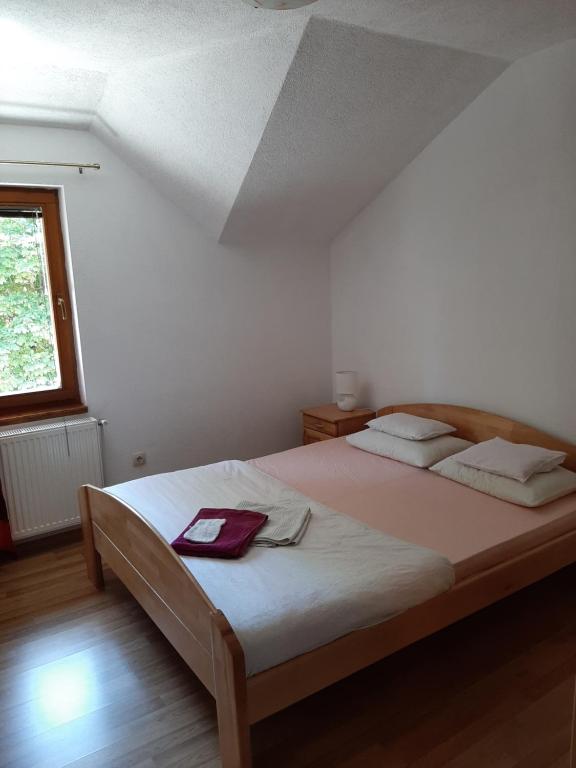 Ένα ή περισσότερα κρεβάτια σε δωμάτιο στο Željo