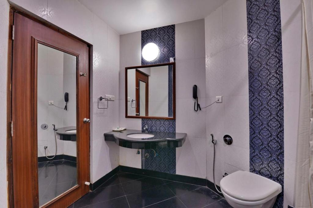 Koupelna v ubytování Hotel Sidharth
