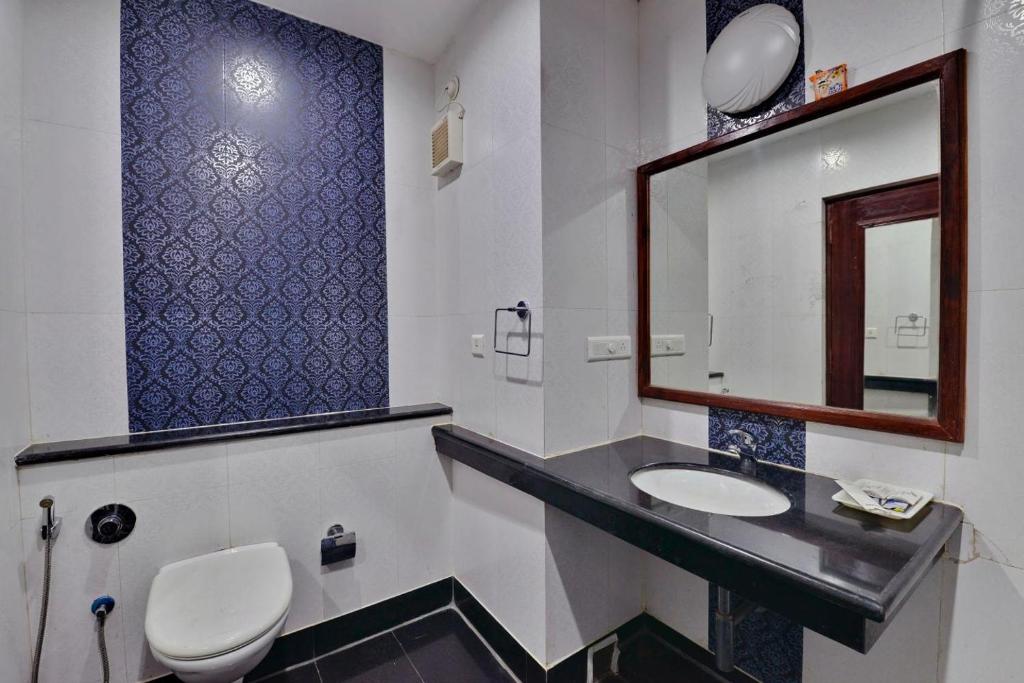 Koupelna v ubytování Hotel Sidharth