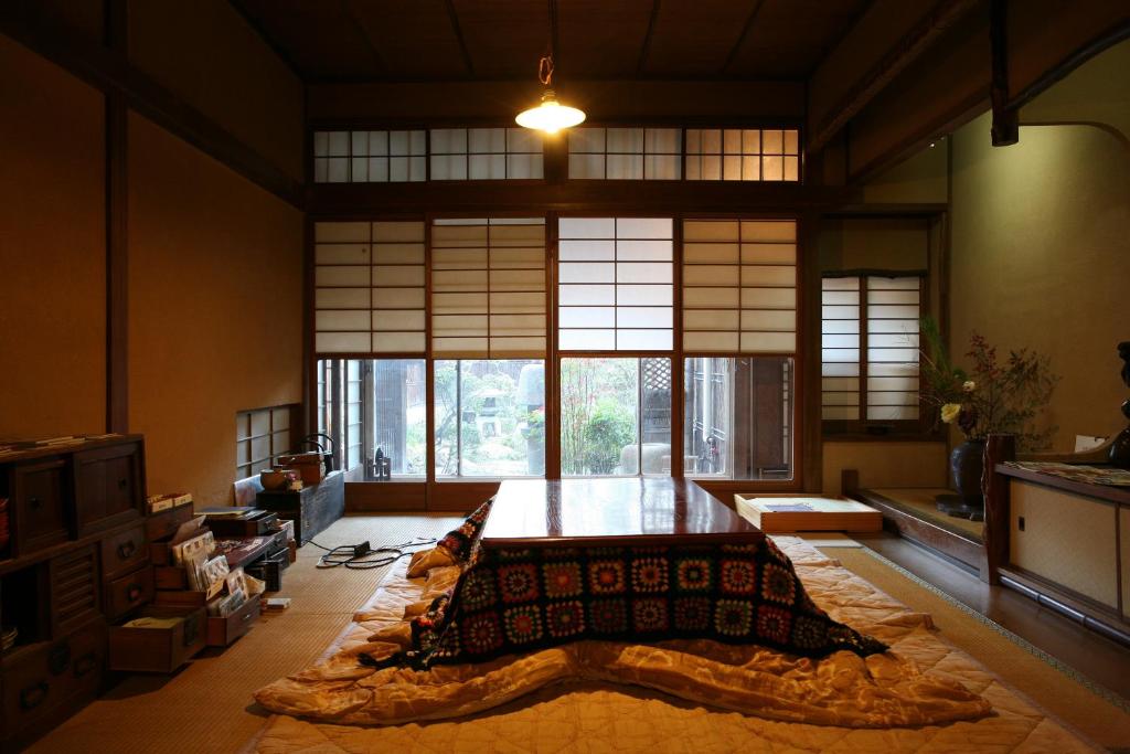Postel nebo postele na pokoji v ubytování Onomichi Guest House Anago-no-Nedoko