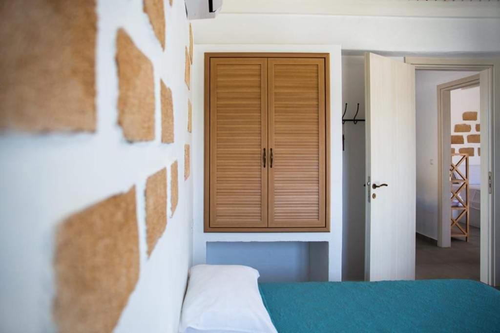 Postel nebo postele na pokoji v ubytování Pontoria Stegna Studios