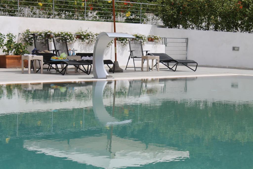 Bazén v ubytování Miglio d'Oro Park Hotel nebo v jeho okolí