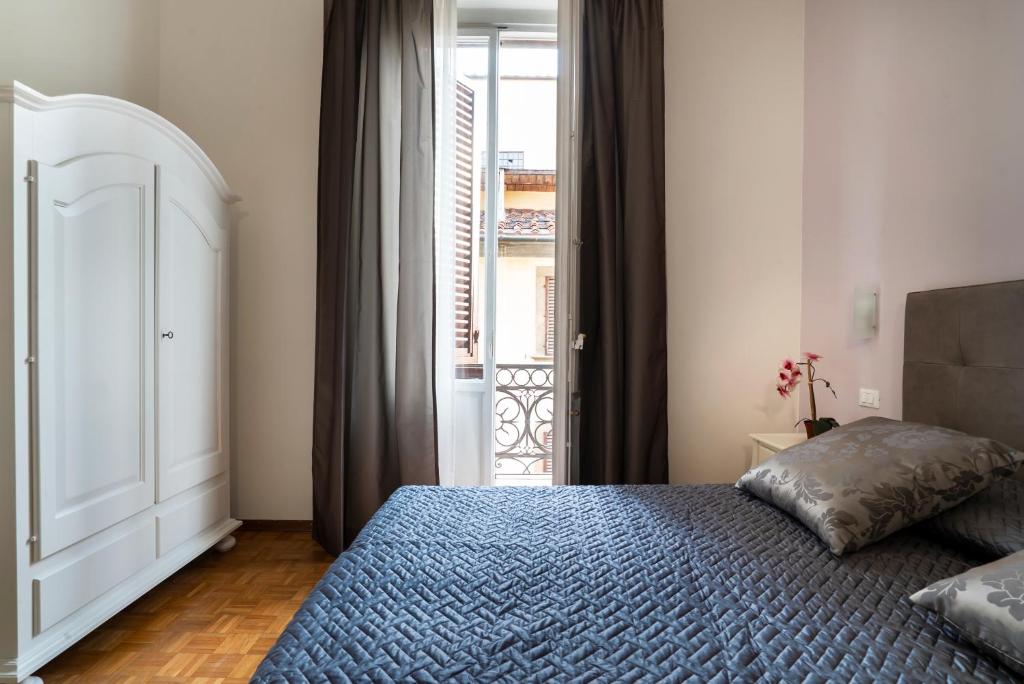 Posteľ alebo postele v izbe v ubytovaní Live Florence Guest House