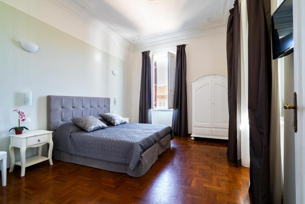 Posteľ alebo postele v izbe v ubytovaní Live Florence Guest House