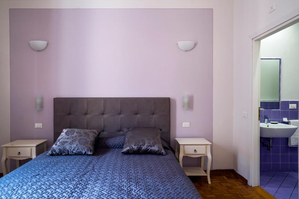 Posteľ alebo postele v izbe v ubytovaní Live Florence Guest House