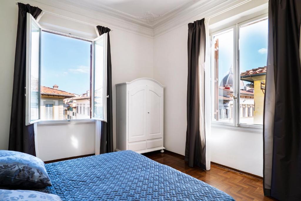 Posteľ alebo postele v izbe v ubytovaní Live Florence Guest House