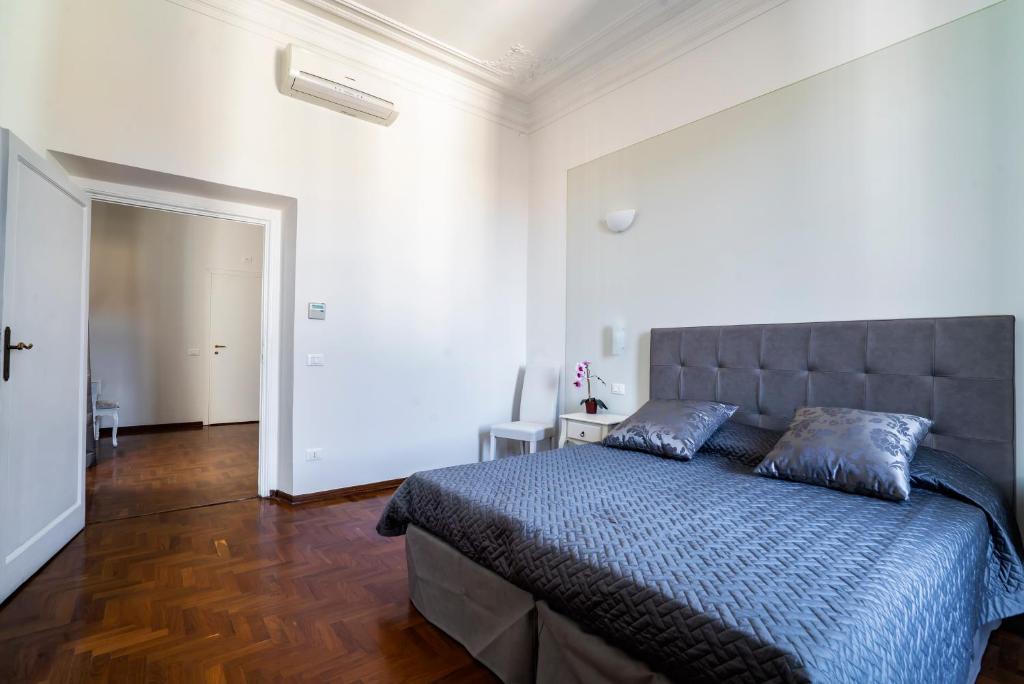 Posteľ alebo postele v izbe v ubytovaní Live Florence Guest House