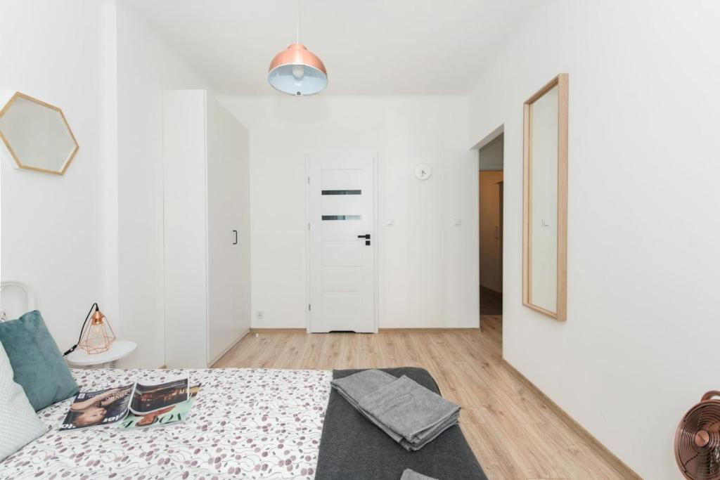 Posteľ alebo postele v izbe v ubytovaní SuperApart Gagarina MiniStudio