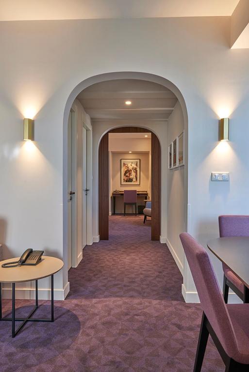 Posezení v ubytování M Suite Hotel