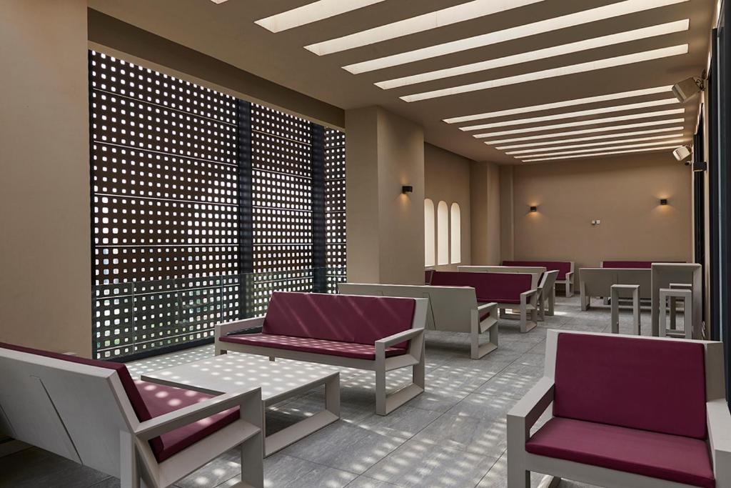 Posezení v ubytování M Suite Hotel