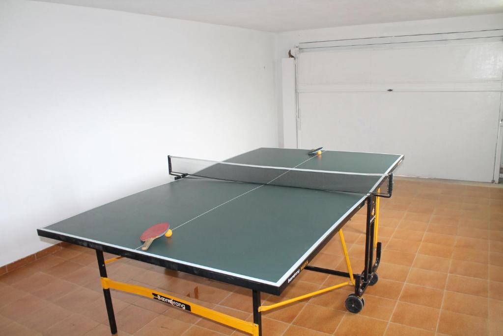 Stolní tenis v ubytování El racó del Puig nebo okolí