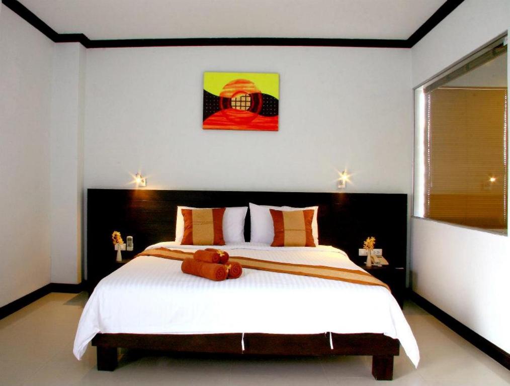 Postel nebo postele na pokoji v ubytování Tanawit Hotel & Spa