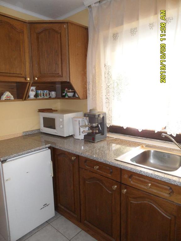 Kuchnia lub aneks kuchenny w obiekcie Apartmanház Gabriella
